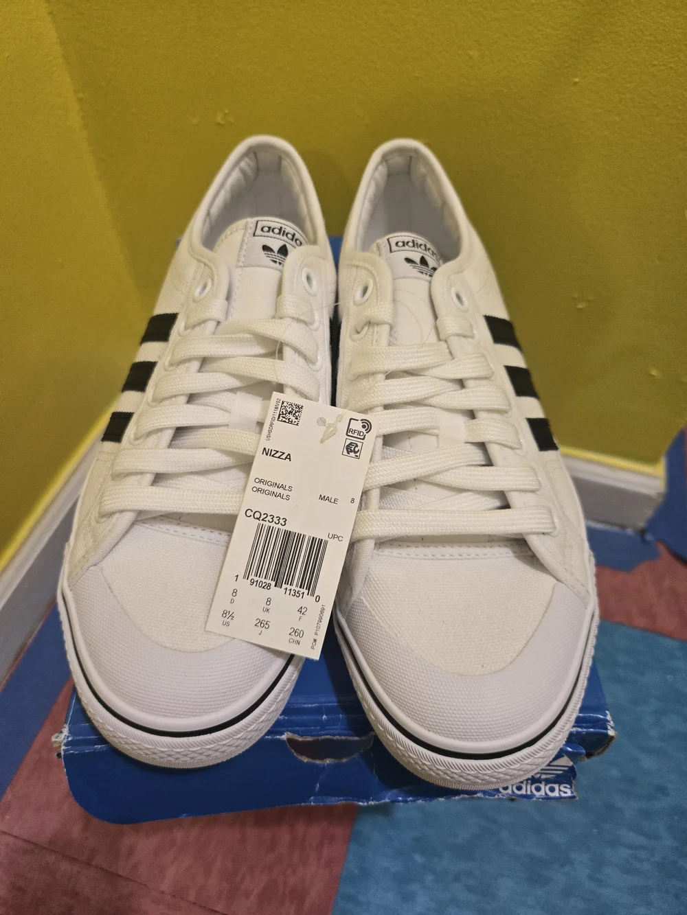 adidas Nizza White Sneakers with Black Stripes